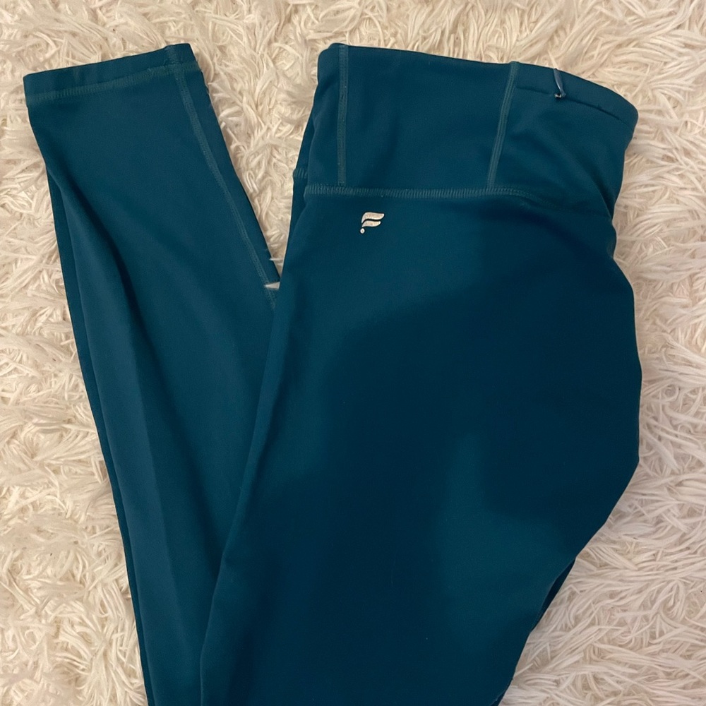 Teal fabletics leggings with pocket